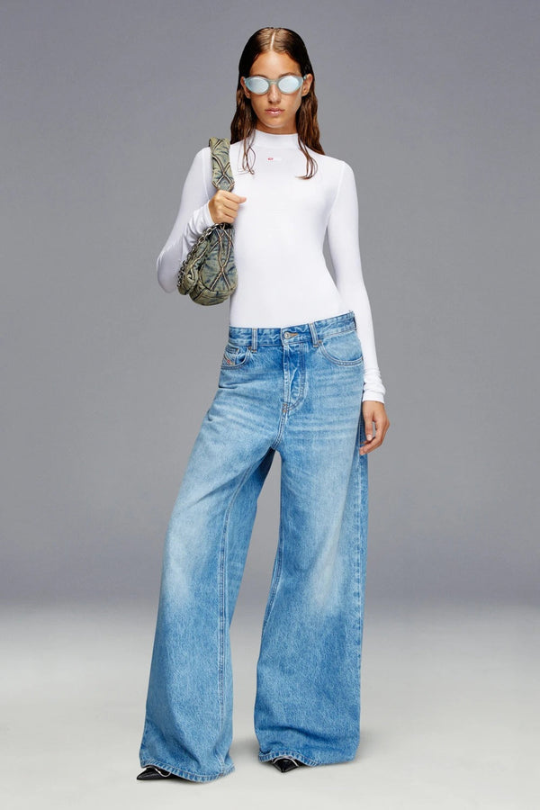 1996 D-Sire — The widest, the lowest, the loosest of our denim silhouettes, slightly flared. Cut to m...
